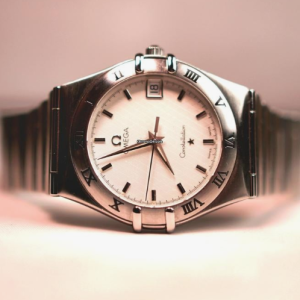 Omega Constellation Perpetual Calendar (often called “Manhattan” style)